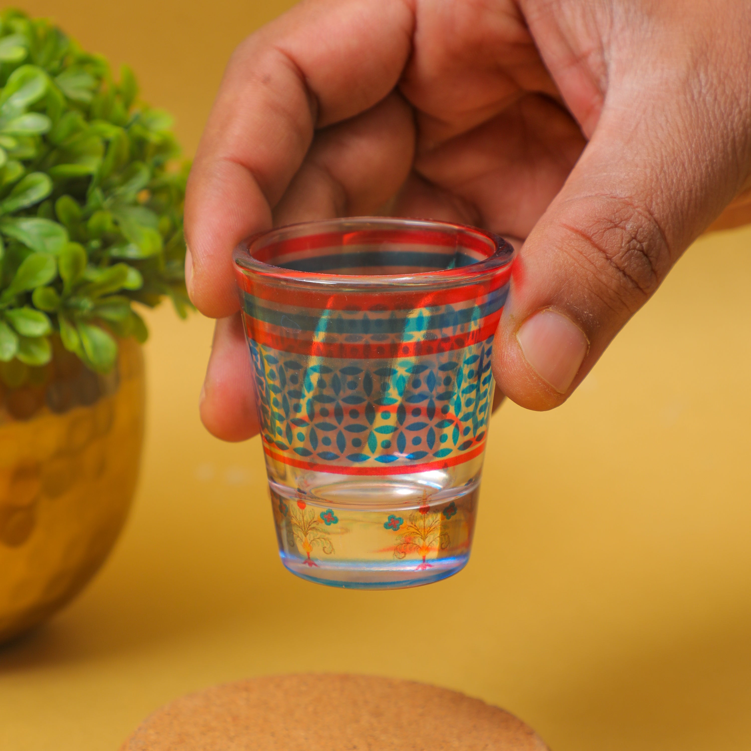 holding shot glass